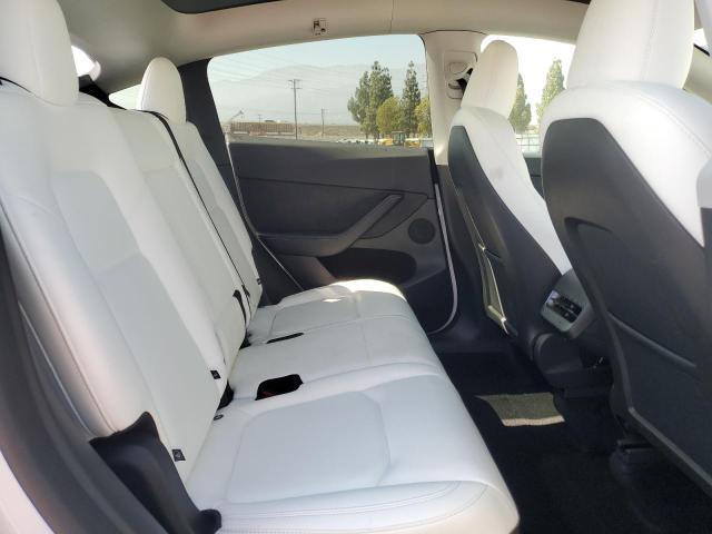 Photo 11 from auction – 2025 TESLA MODEL Y with VIN 7SAYGAEE9SF239014