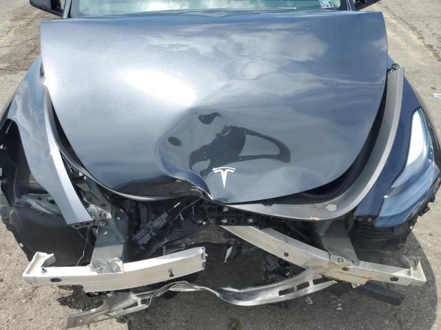 Photo 11 from auction – 2025 TESLA MODEL Y with VIN 7SAYGAEE2SF222975