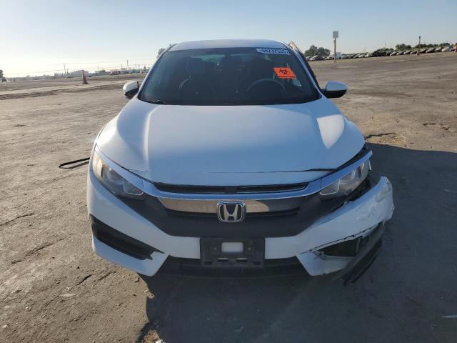 Photo 5 from auction – 2017 HONDA CIVIC LX with VIN 2HGFC2F5XHH520120