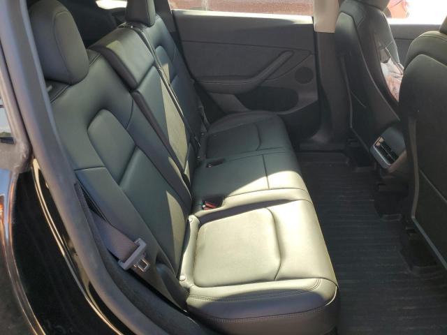 Photo 11 from auction – 2023 TESLA MODEL Y with VIN 7SAYGDED1PF967006