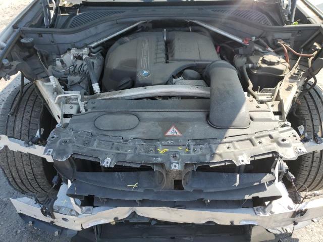 Photo 12 from auction – 2015 BMW X5 XDRIVE3 with VIN 5UXKR0C5XF0P12397