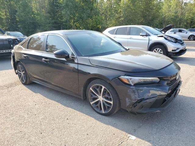 Photo 4 from auction – 2023 HONDA CIVIC TOUR with VIN 2HGFE1F99PH002702