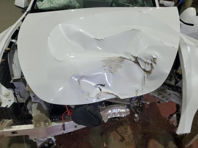 Photo 11 from auction – 2023 TESLA MODEL Y with VIN 7SAYGDEE7PF610311