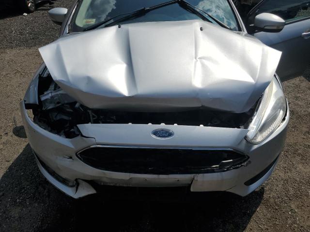 Photo 11 from auction – 2017 FORD FOCUS SE with VIN 1FADP3F22HL309038