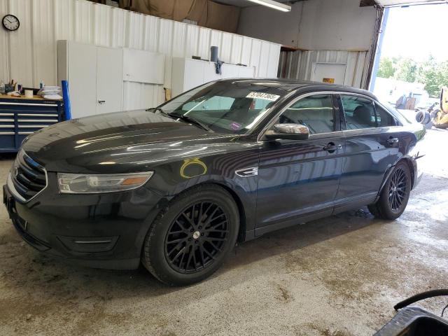 FORD TAURUS LIM 2014 with VIN 1FAHP2F85EG102714 - Photo from auction
