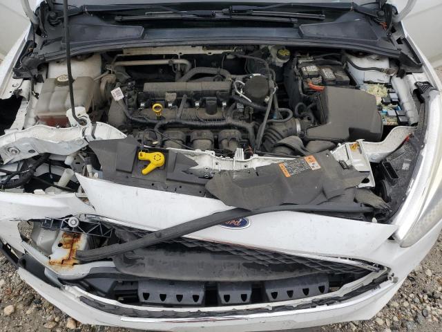Photo 11 from auction – 2015 FORD FOCUS S with VIN 1FADP3E29FL381773