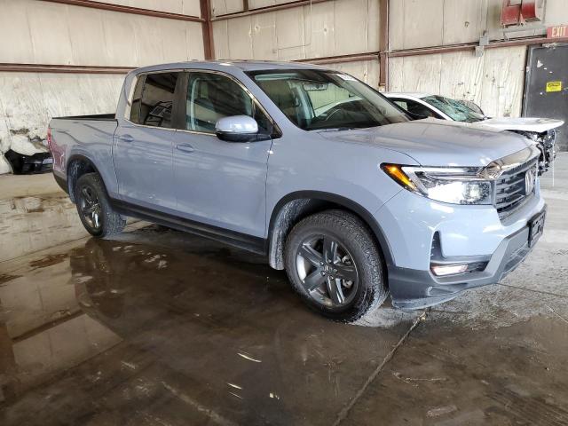 Photo 4 from auction – 2023 HONDA RIDGELINE with VIN 5FPYK3F55PB056780