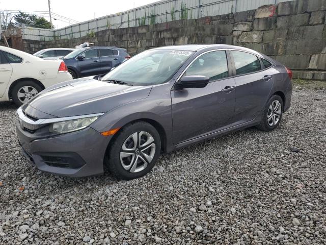 HONDA CIVIC LX 2018 with VIN 19XFC2F52JE042002 - Photo from auction