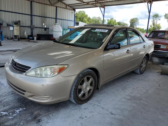TOYOTA CAMRY LE 2002 with VIN 4T1BF30KX2U526802 - Photo from auction