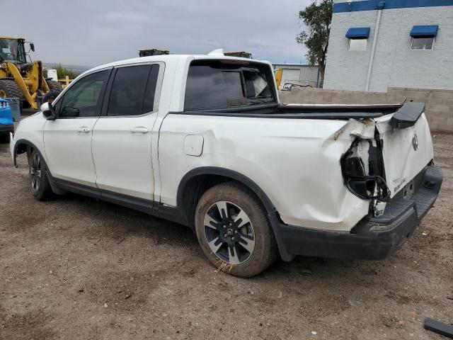 Photo 2 from auction – 2020 HONDA RIDGELINE with VIN 5FPYK2F58LB000076