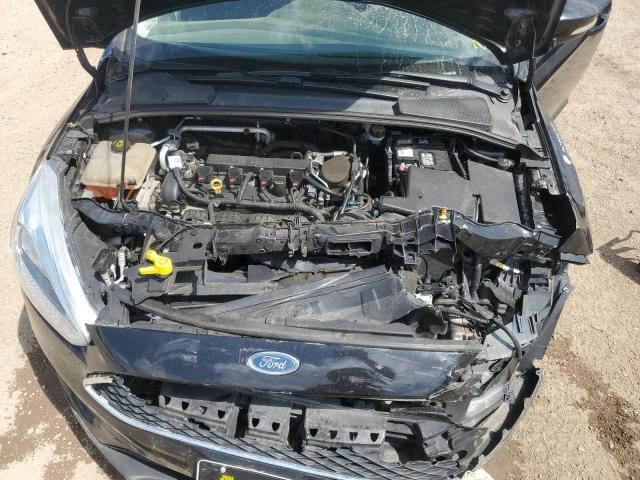 Photo 11 from auction – 2015 FORD FOCUS SE with VIN 1FADP3F21FL200809