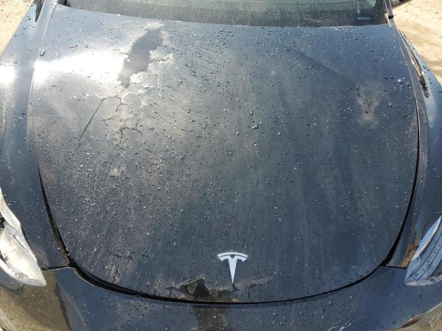Photo 12 from auction – 2022 TESLA MODEL Y with VIN 7SAYGDEF6NF345614