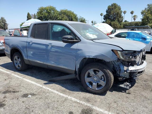Photo 4 from auction – 2025 HONDA RIDGELINE with VIN 5FPYK3F60SB015510