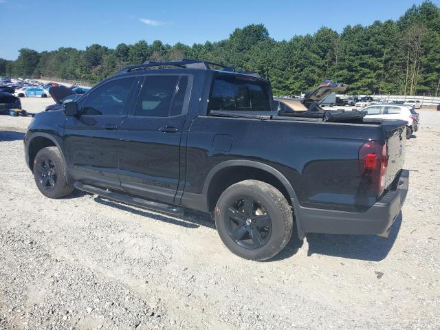 Photo 2 from auction – 2022 HONDA RIDGELINE with VIN 5FPYK3F82NB000240