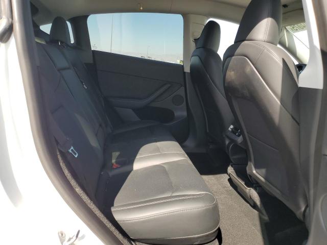 Photo 11 from auction – 2023 TESLA MODEL Y with VIN 7SAYGDEE6PA068597
