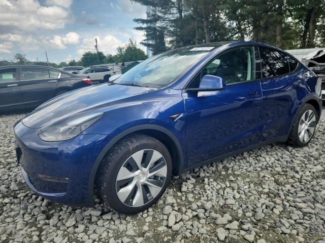 TESLA MODEL Y 2023 with VIN 7SAYGAEE7PF797905 - Photo from auction