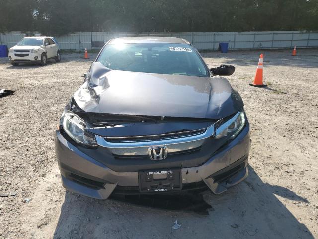 Photo 5 from auction – 2018 HONDA CIVIC LX with VIN 19XFC2F57JE033134
