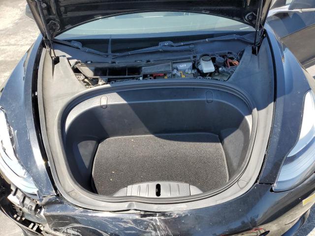 Photo 11 from auction – 2018 TESLA MODEL 3 with VIN 5YJ3E1EA4JF052319