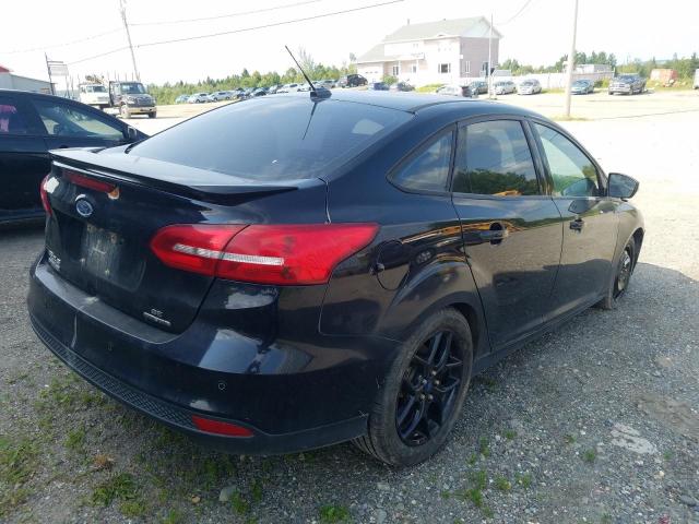 Photo 3 from auction – 2016 FORD FOCUS SE with VIN 1FADP3F24GL200367