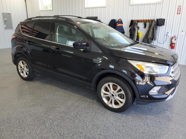 Photo 4 from auction – 2018 FORD ESCAPE SE with VIN 1FMCU9GD9JUC58456