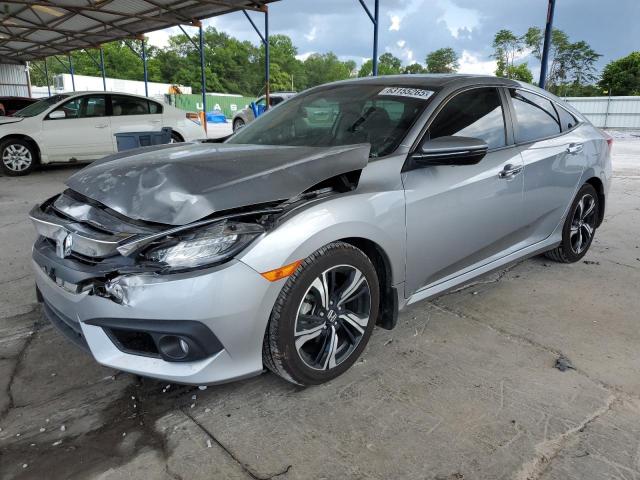 HONDA CIVIC TOUR 2016 with VIN 19XFC1F91GE045561 - Photo from auction