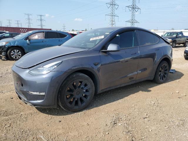 TESLA MODEL Y 2023 with VIN 7SAYGDEE0PA031593 - Photo from auction