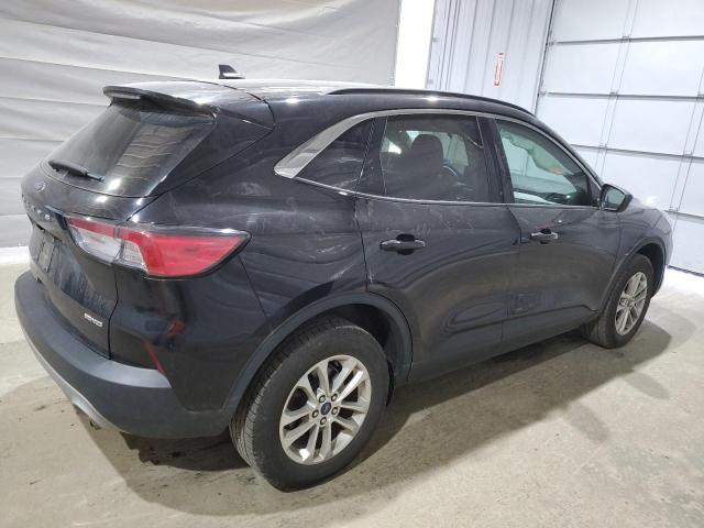 Photo 3 from auction – 2021 FORD ESCAPE SE with VIN 1FMCU9G65MUB29457
