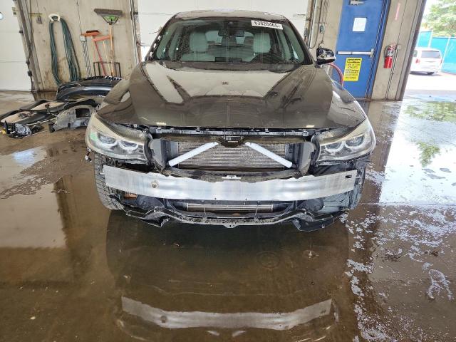 Photo 5 from auction – 2015 BMW 335 XIGT with VIN WBA3X9C54FD868389