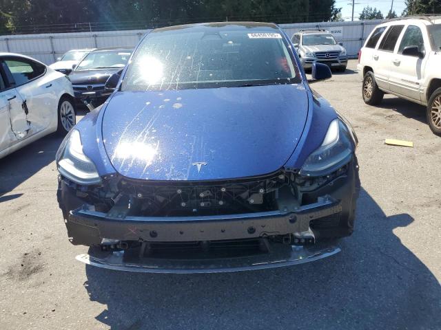 Photo 5 from auction – 2022 TESLA MODEL Y with VIN 7SAYGAEE2NF558307