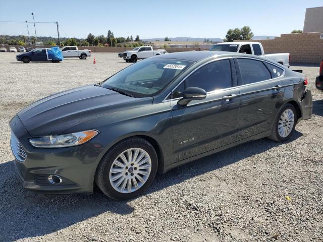 FORD FUSION 2015 with VIN 3FA6P0LU7FR128321 - Photo from auction