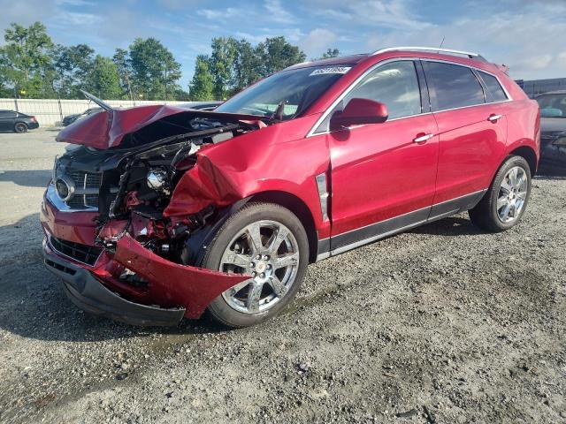 CADILLAC SRX 2011 with VIN 3GYFNEEY5BS609811 - Photo from auction