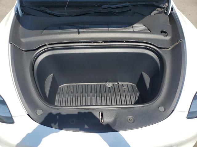 Photo 12 from auction – 2023 TESLA MODEL Y with VIN 7SAYGDEEXPA036901