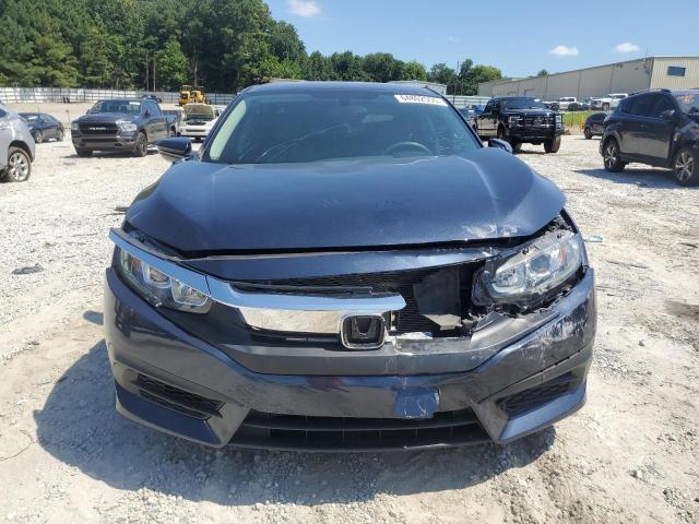 Photo 5 from auction – 2018 HONDA CIVIC LX with VIN 19XFC2F59JE042160