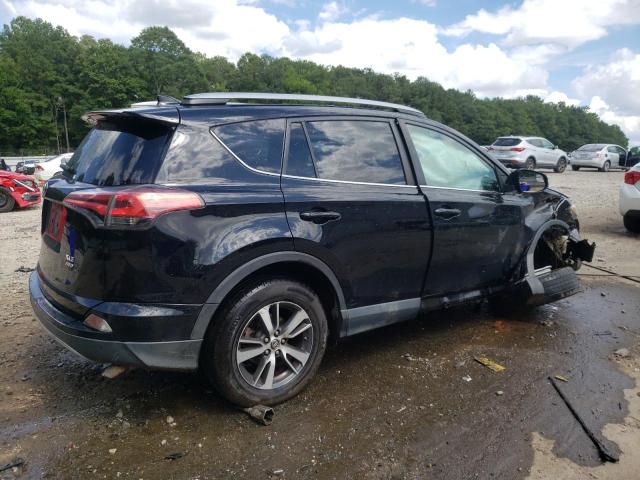 Photo 3 from auction – 2017 TOYOTA RAV4 XLE with VIN 2T3RFREV1HW659680