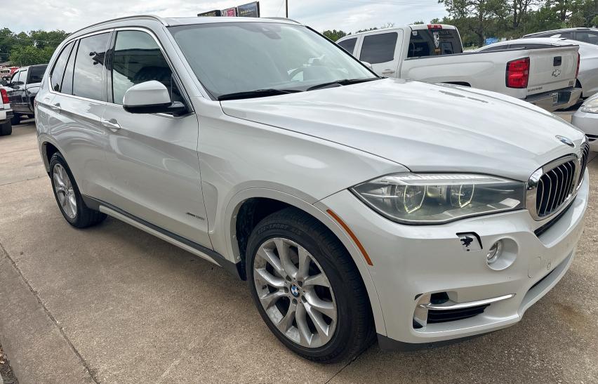 BMW X5 XDRIVE5 2014 with VIN 5UXKR6C52E0C03067 - Photo from auction