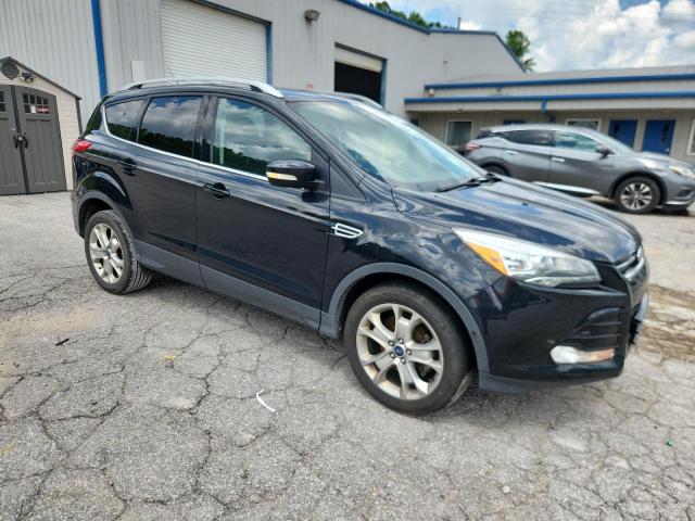 Photo 4 from auction – 2014 FORD ESCAPE TITANIUM with VIN 1FMCU0JX7EUB77542