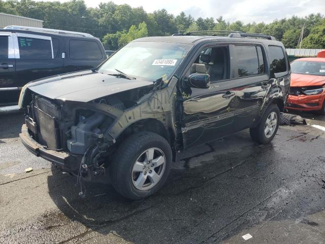 HONDA PILOT EXL 2011 with VIN 5FNYF4H52BB029514 - Photo from auction