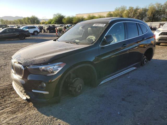 BMW X1 2018 with VIN WBXHU7C37J5L06464 - Photo from auction