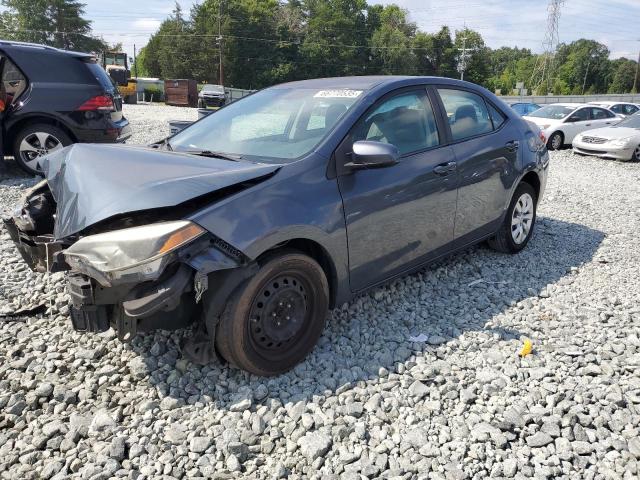 TOYOTA COROLLA L 2014 with VIN 5YFBURHE7EP067211 - Photo from auction