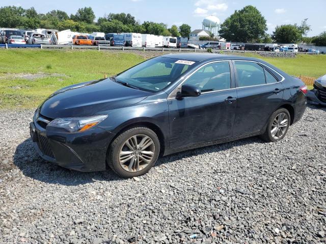 TOYOTA CAMRY LE 2017 with VIN 4T1BF1FKXHU274960 - Photo from auction
