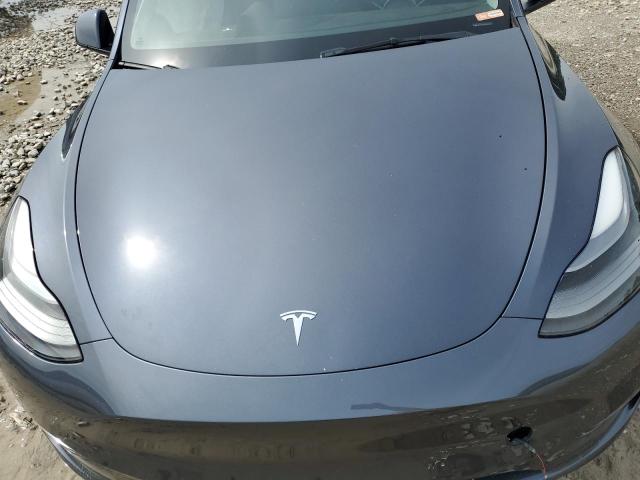 Photo 11 from auction – 2022 TESLA MODEL Y with VIN 7SAYGDEF9NF455315