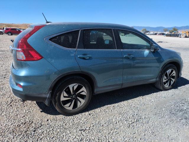 Photo 3 from auction – 2016 HONDA CR-V TOURI with VIN 5J6RM4H93GL065000