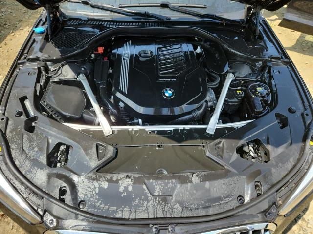 Photo 11 from auction – 2022 BMW 840XI with VIN WBAGV4C04NCJ21085