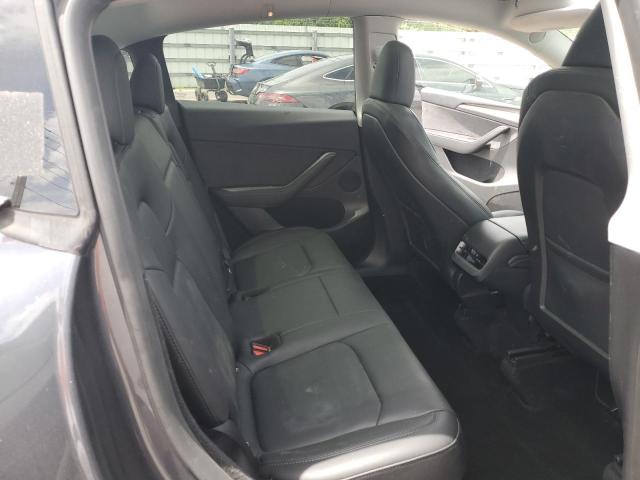 Photo 11 from auction – 2023 TESLA MODEL Y with VIN 7SAYGDEE3PF842887