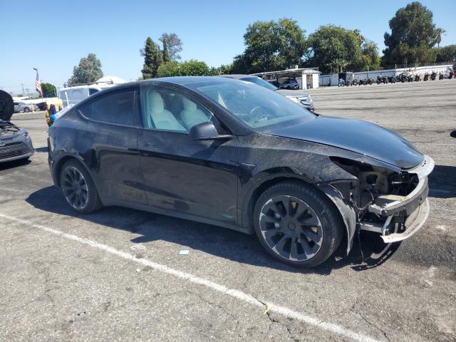 Photo 4 from auction – 2022 TESLA MODEL Y with VIN 7SAYGAEE6NF344422