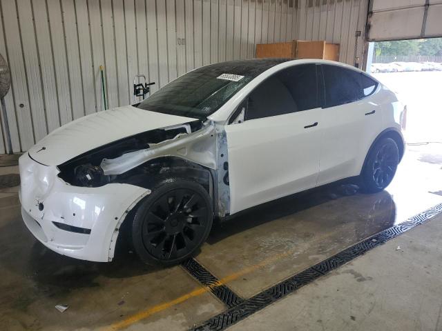 TESLA MODEL Y 2022 with VIN 7SAYGAEE2NF338455 - Photo from auction