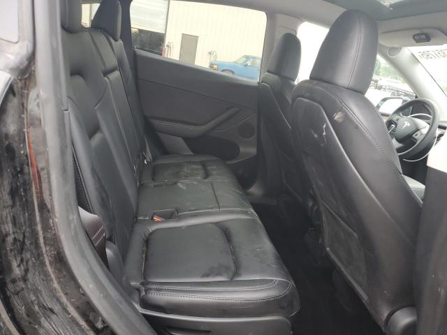 Photo 10 from auction – 2023 TESLA MODEL Y with VIN 7SAYGAEE1PF872291