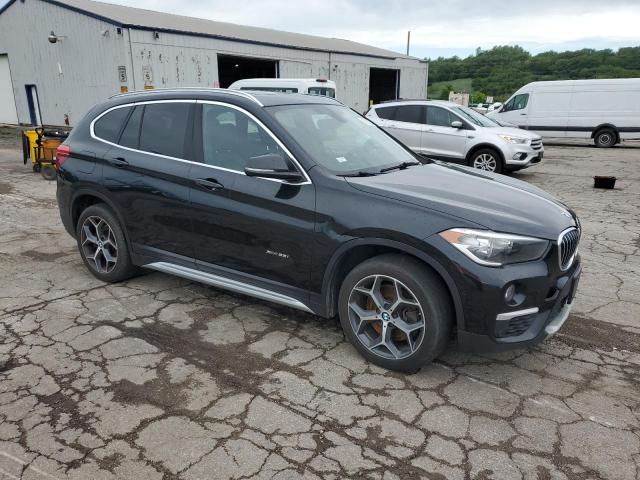 Photo 4 from auction – 2017 BMW X1 XDRIVE2 with VIN WBXHT3C36H5F73684