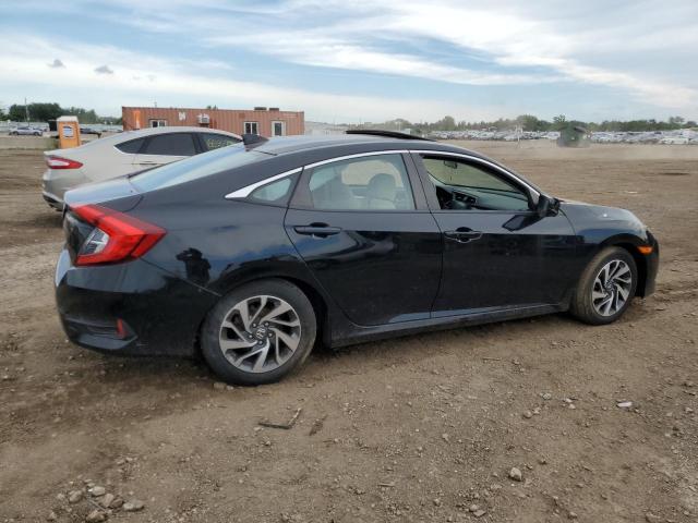 Photo 3 from auction – 2018 HONDA CIVIC EX with VIN 19XFC2F73JE031009