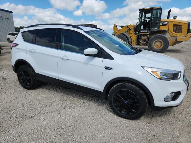 Photo 4 from auction – 2018 FORD ESCAPE SE with VIN 1FMCU9GD0JUC63254